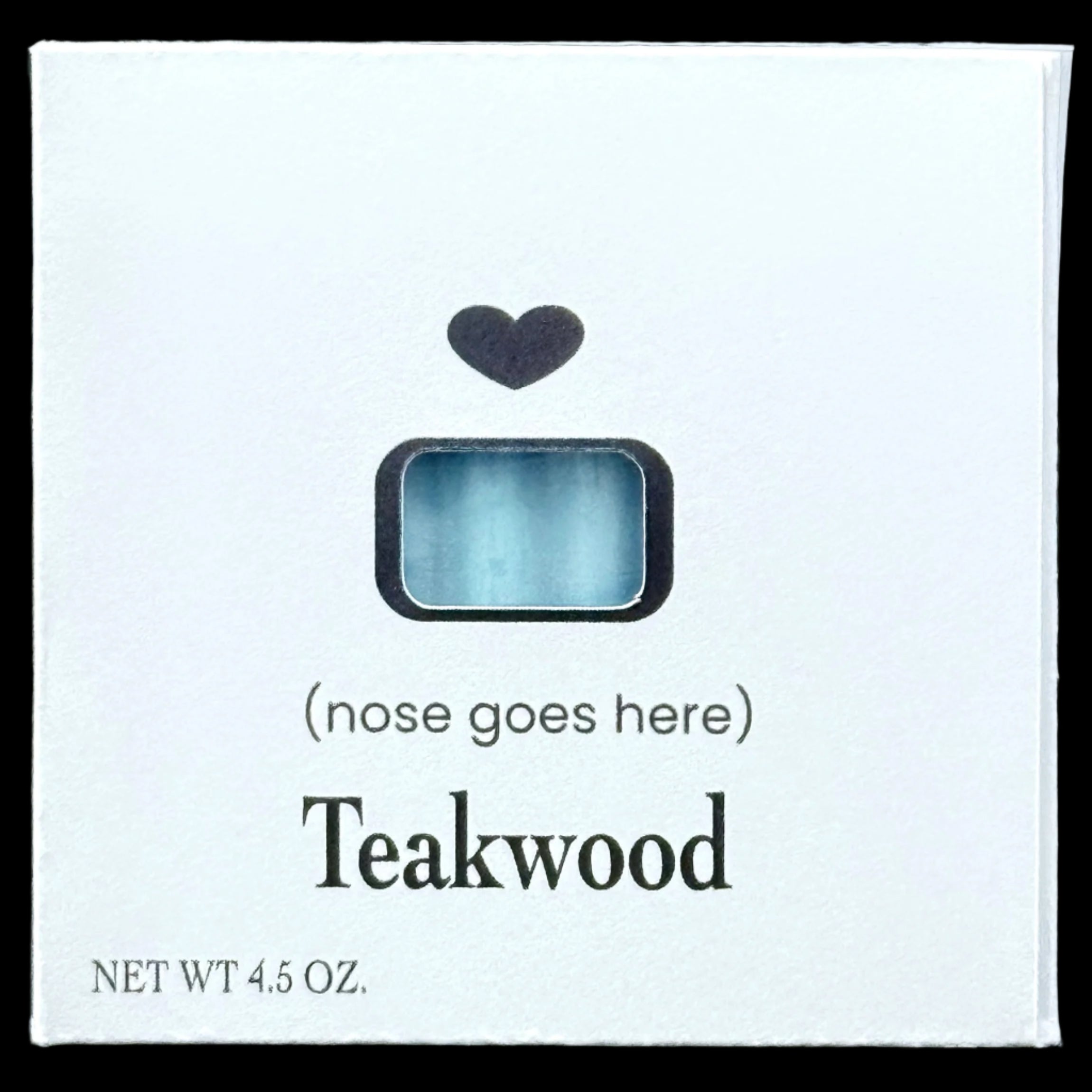 Teakwood perfume box with a heart-shaped hole for a nose on a black background